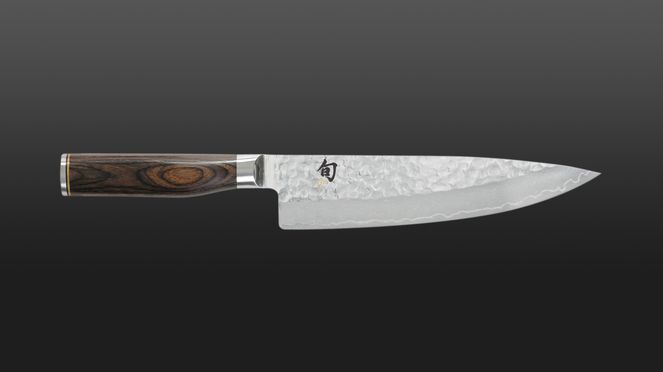 
                    Couteau de cuisine Kai pour la préparation du poisson, de la viande et des légumes.