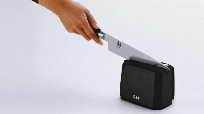 
                    knife sharpener in use