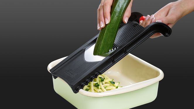 
                    triangle® vegetable slicer in use
