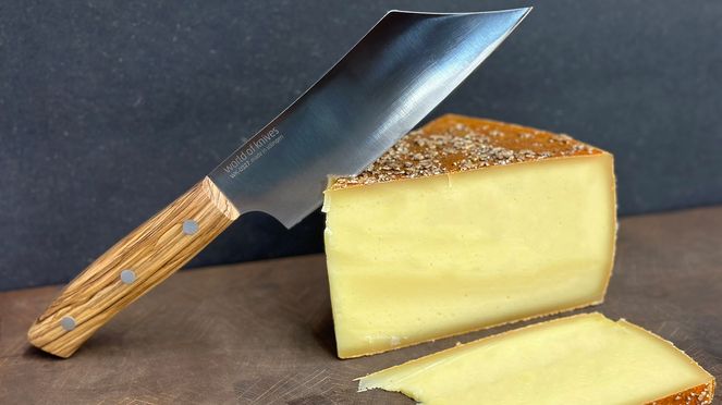 
                    Wok cheese knife for portioning cheese loaves
