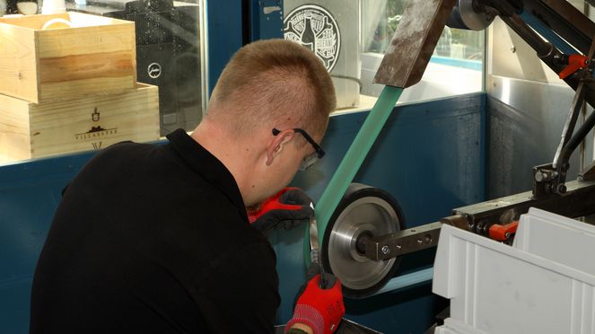 
                    Knife making at open sknife Swiss knife manufactory