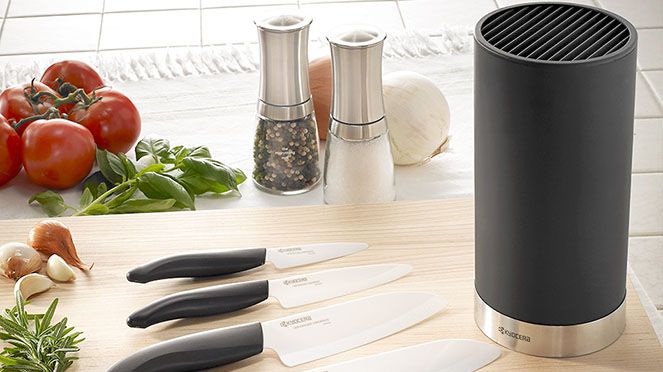 
                    Kyocera knife block with ceramic knives and mill