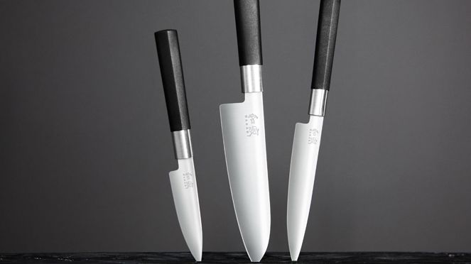 
                    Kai Wasabi knife set with handle embracing the blade