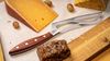 
                    Universal cheese knife cutting cheese effortlessly thanks to thinly ground concave shaft