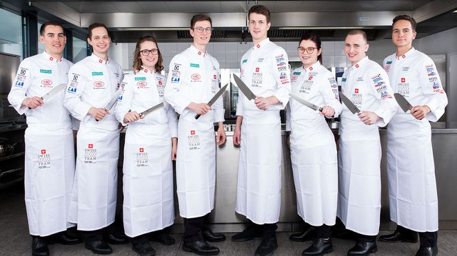 
                    Young national team of cooking with carving fork